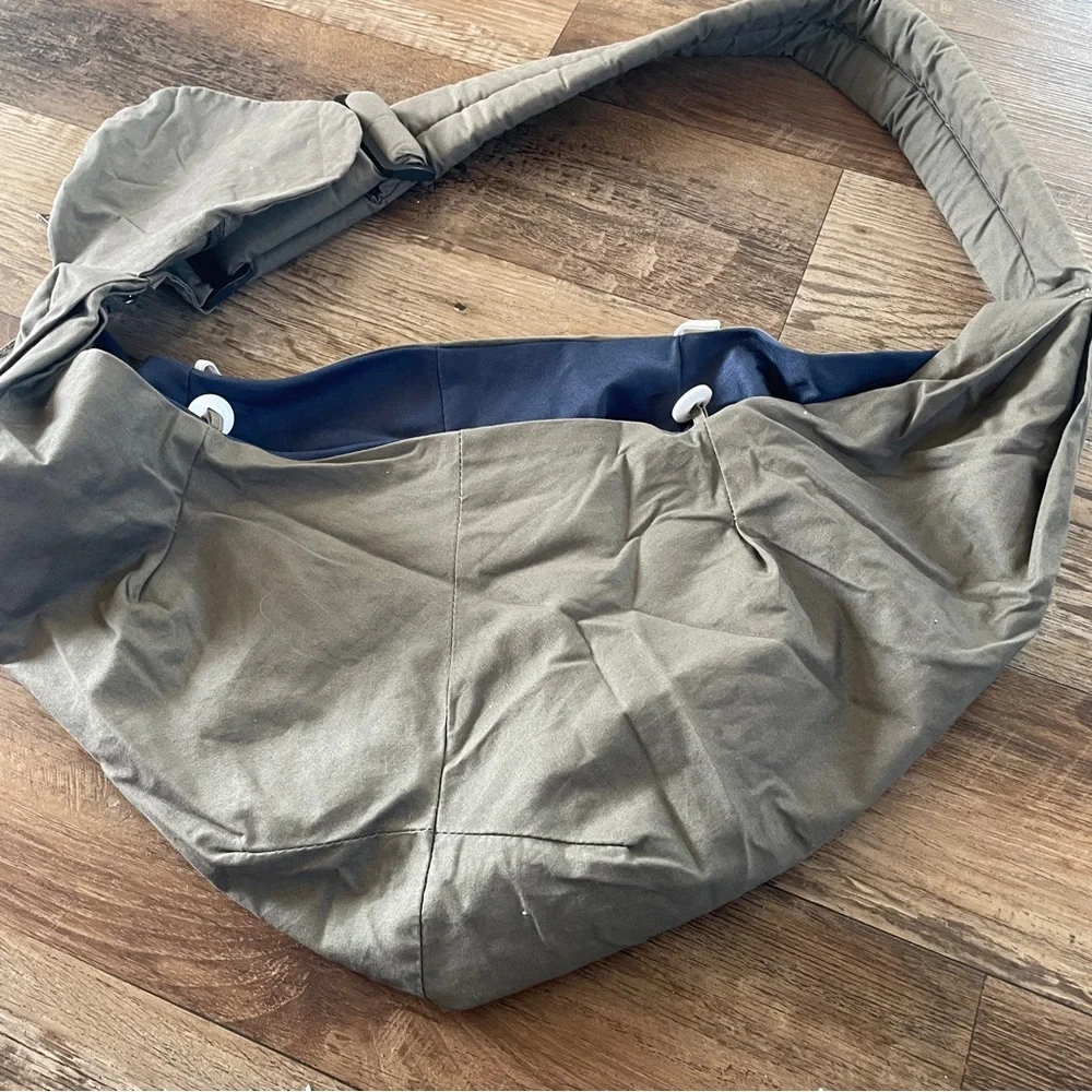 Slow pet, dog or cat sling carrier